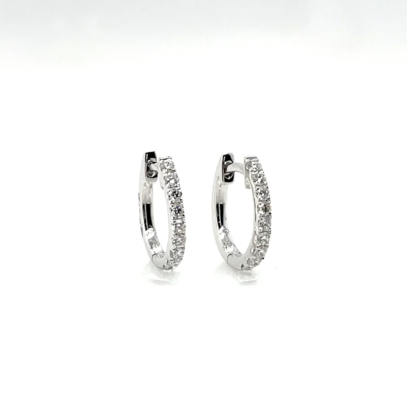 oval hoop earrings with diamonds side view from donna jewelry company chicago