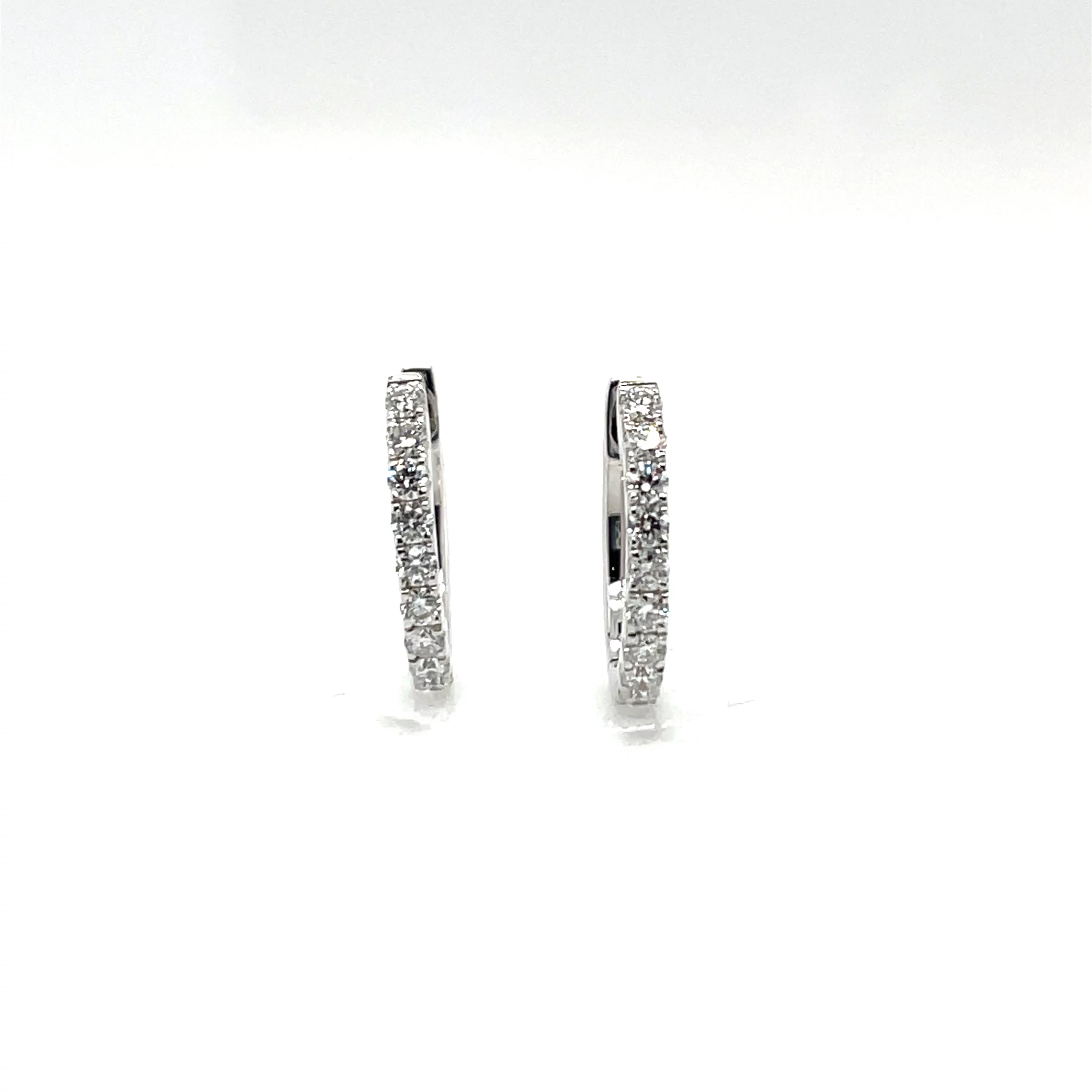 oval hoop earrings with diamonds front view from donna jewelry company chicago